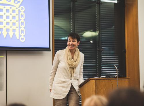 Caroline Lucas speaking at event 