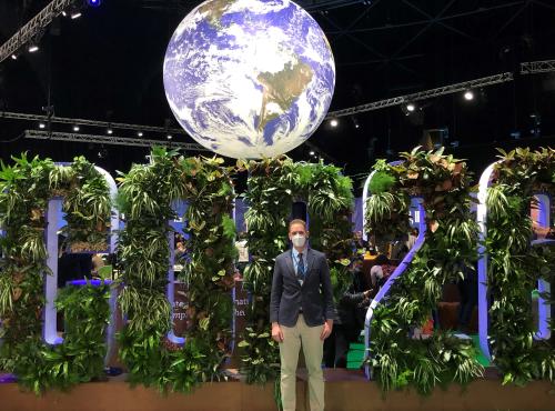 Rob in front of COP26 sign