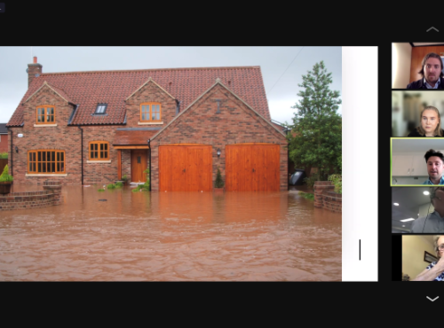 A flooded house discussed at the roundtable