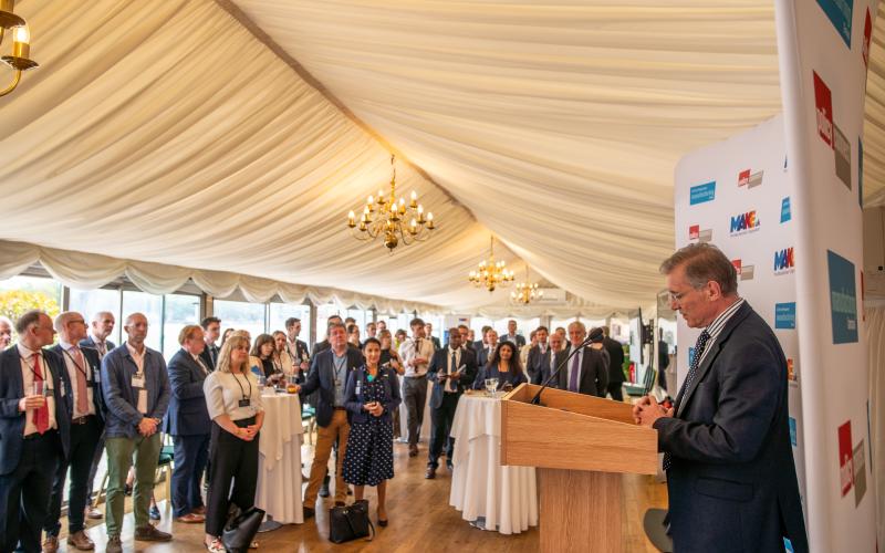 Mark Pawsey MP speaking at lectern 