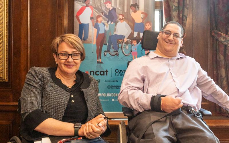 Tanni Grey-Thompson and Clive Gilbert smiling to the camera