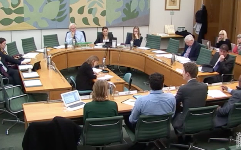 view of select committee members at a hearing